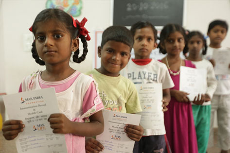Children with their MIF Health Cards